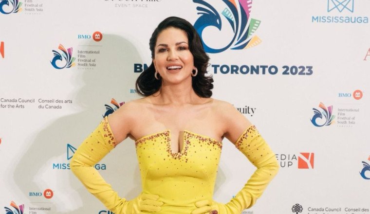 Sunny Leone Shines in Stunning Yellow Gown at IFFSA's Glittering Red Carpet Event